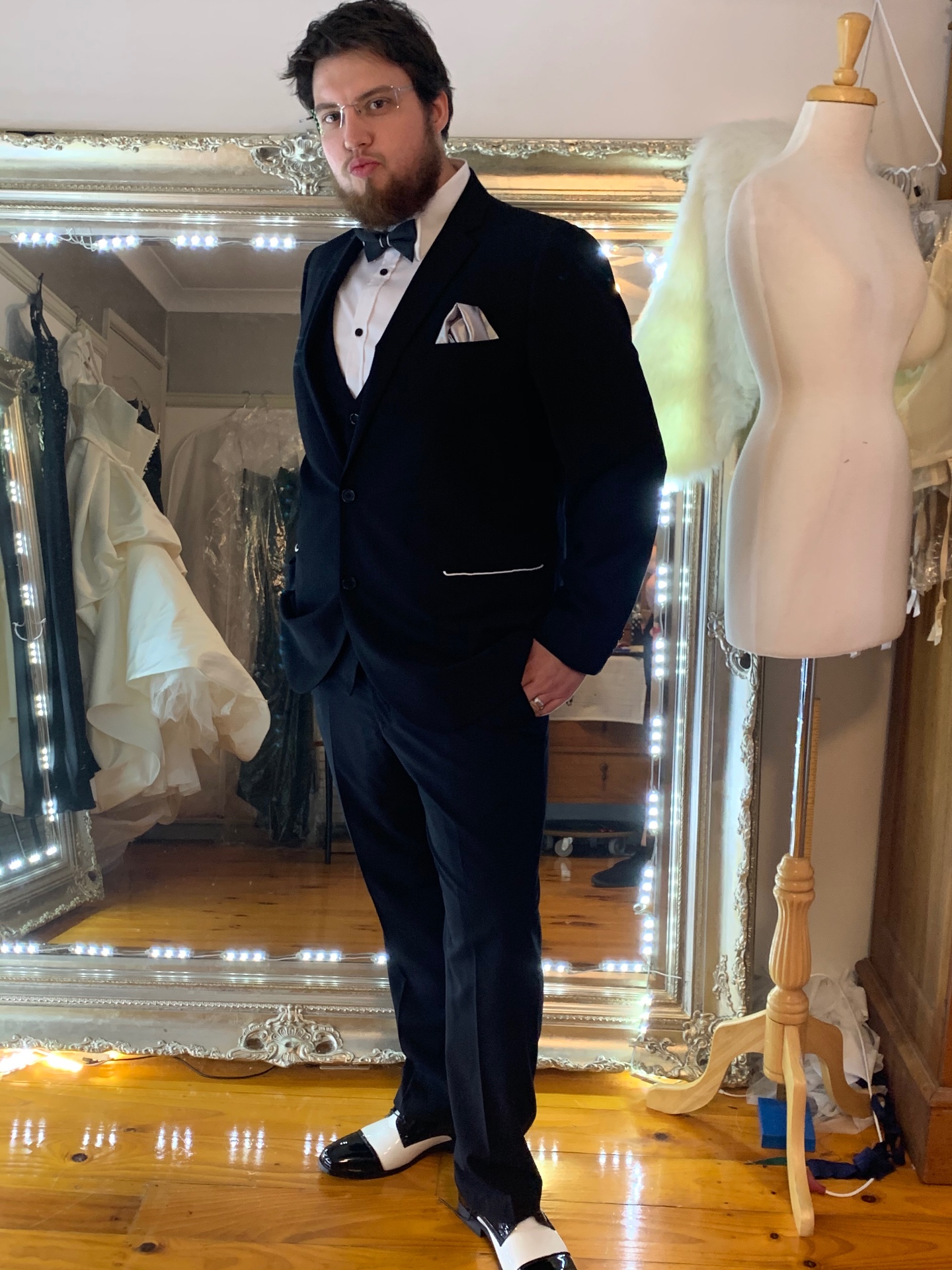 Three-piece navy tuxedo with bow tie and pocket square, tailored fit — precision tailoring and alterations by Jacqui